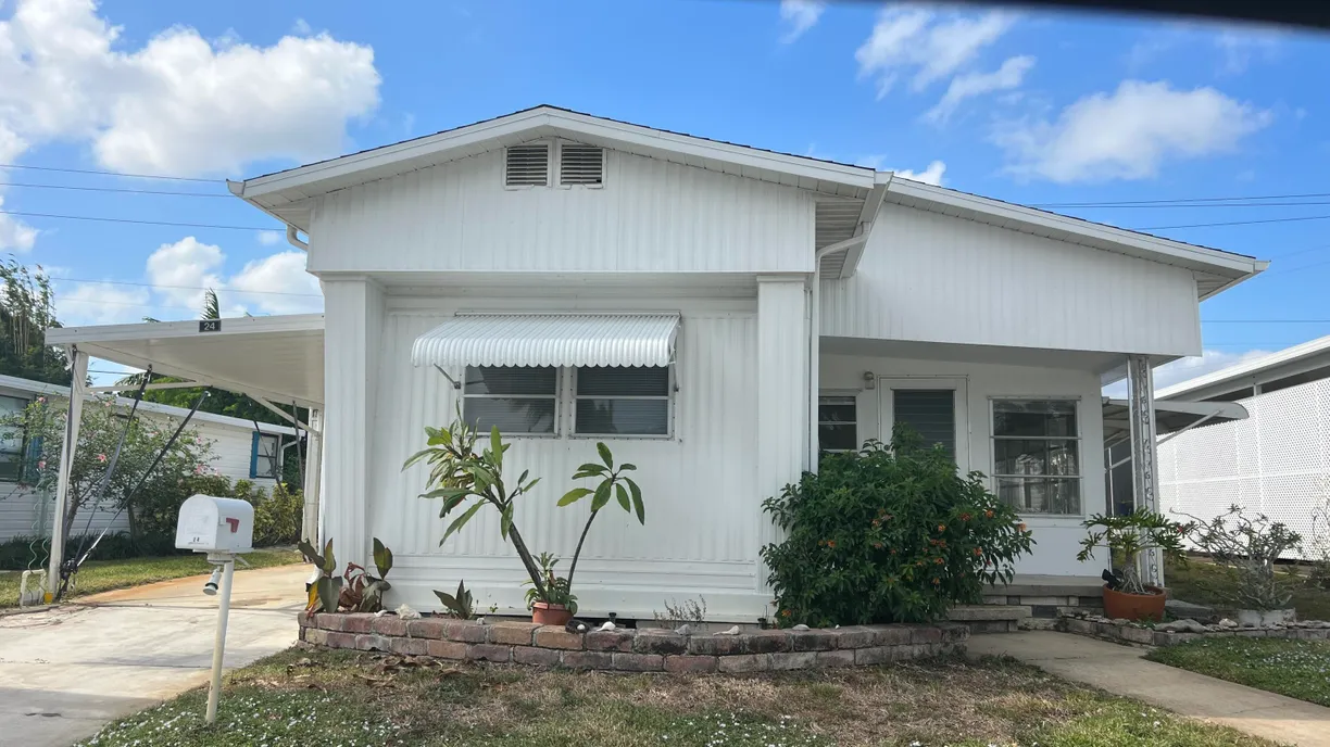 South Florida Real Estate | View 4300 SE Saint Lucie Boulevard, 24 | 2 Beds, 2 Baths