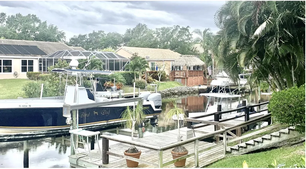 South Florida Real Estate | View 8864 SE Water Oak Place | 4 Beds, 3 Baths