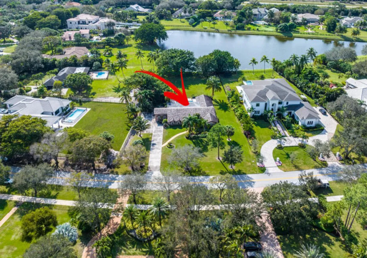 South Florida Real Estate | View 7807 Steeplechase Drive | 5 Beds, 3 Baths