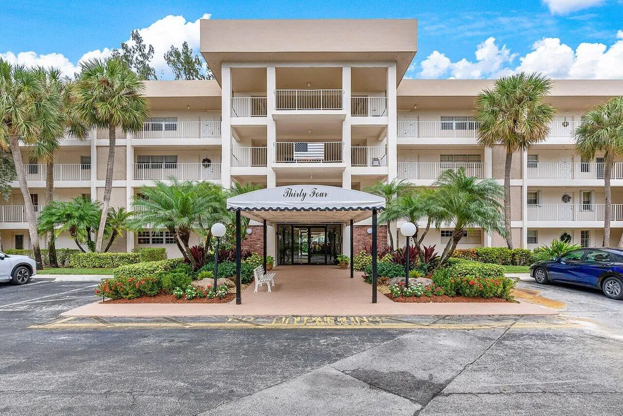 South Florida Real Estate | View 3051 S Palm Aire Drive, 106 | 2 Beds, 2 Baths