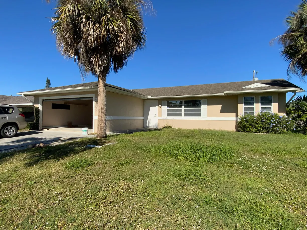 South Florida Real Estate | View 971 SW Kappa Avenue | 3 Beds, 2 Baths