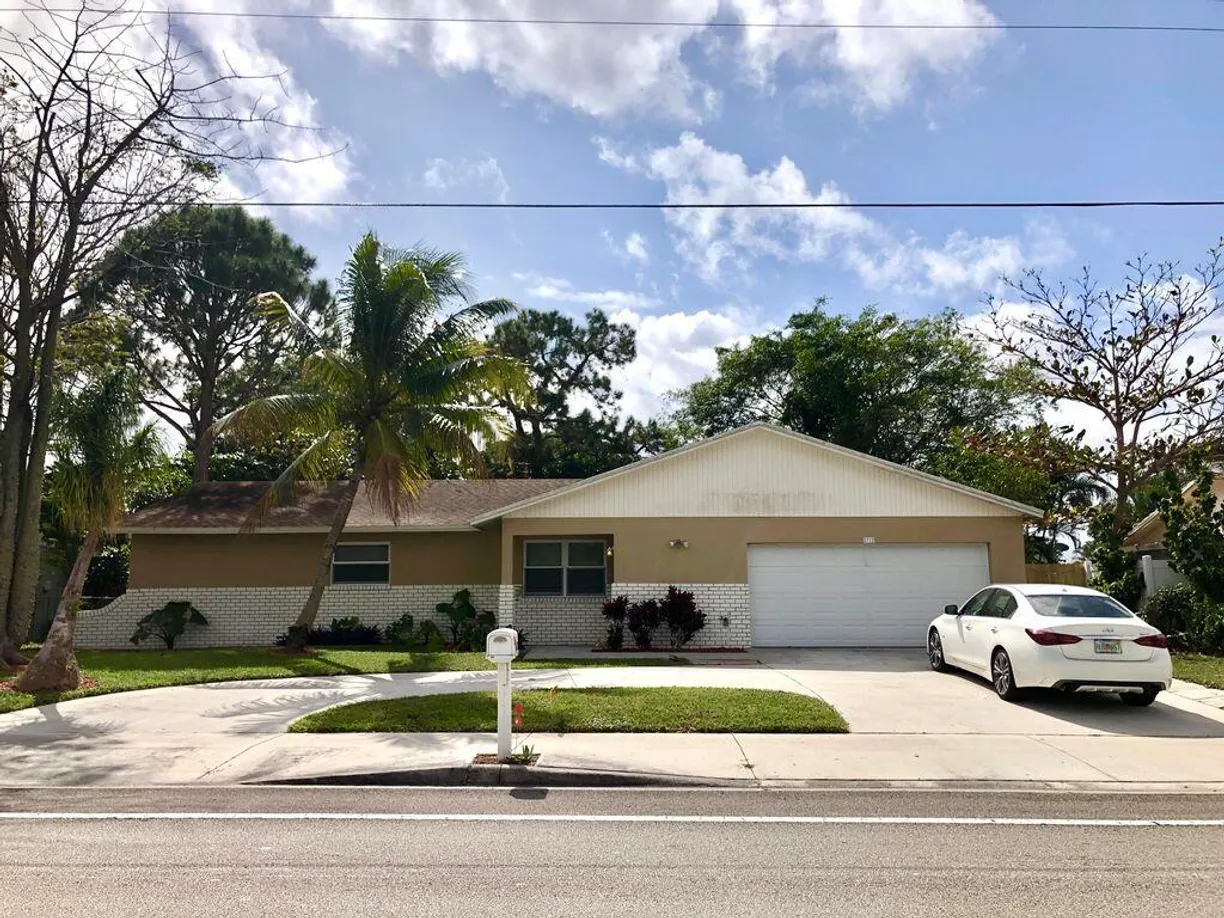 South Florida Real Estate | View 2712 Lake Ida Road | 3 Beds, 2 Baths