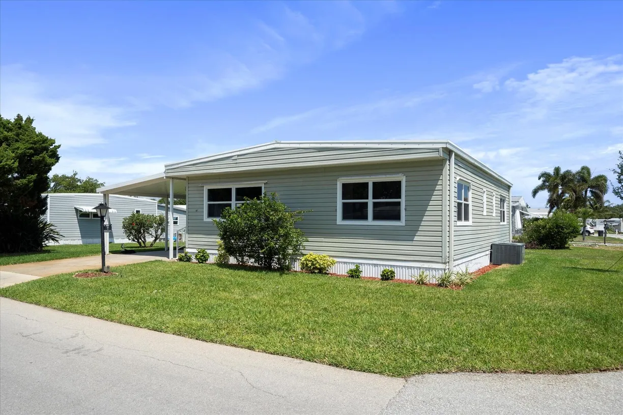 South Florida Real Estate | View 309 NE Pinelake Village Boulevard | Listing