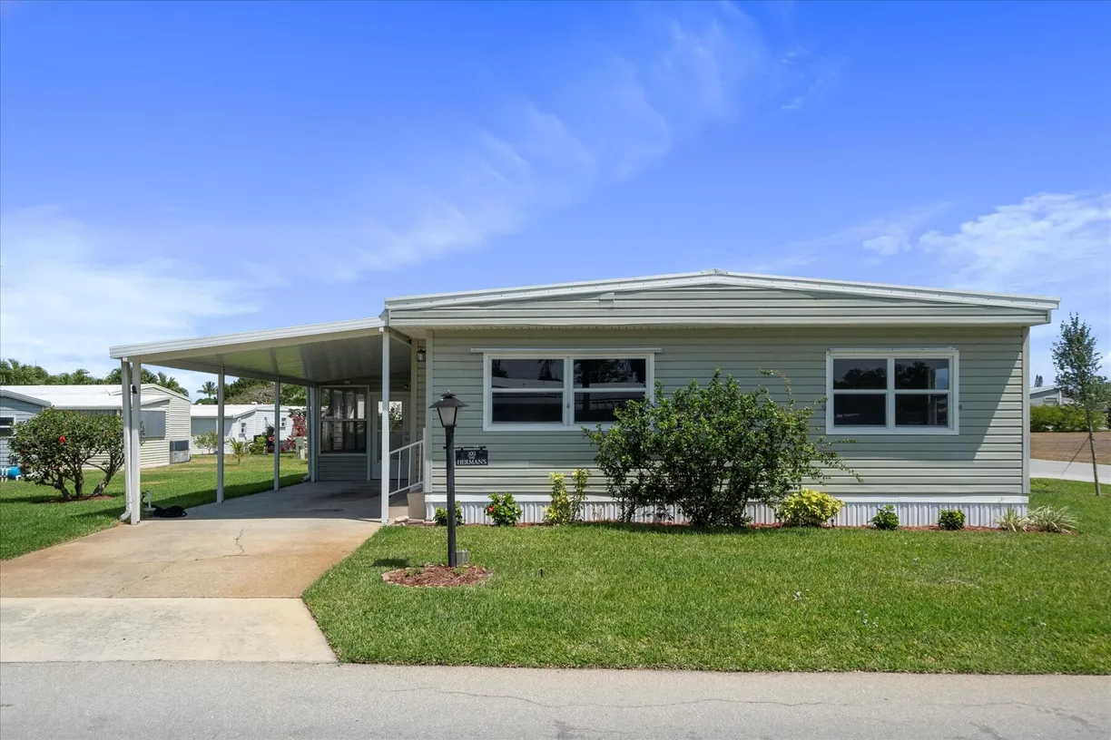 South Florida Real Estate | View 309 NE Pinelake Village Boulevard | Listing