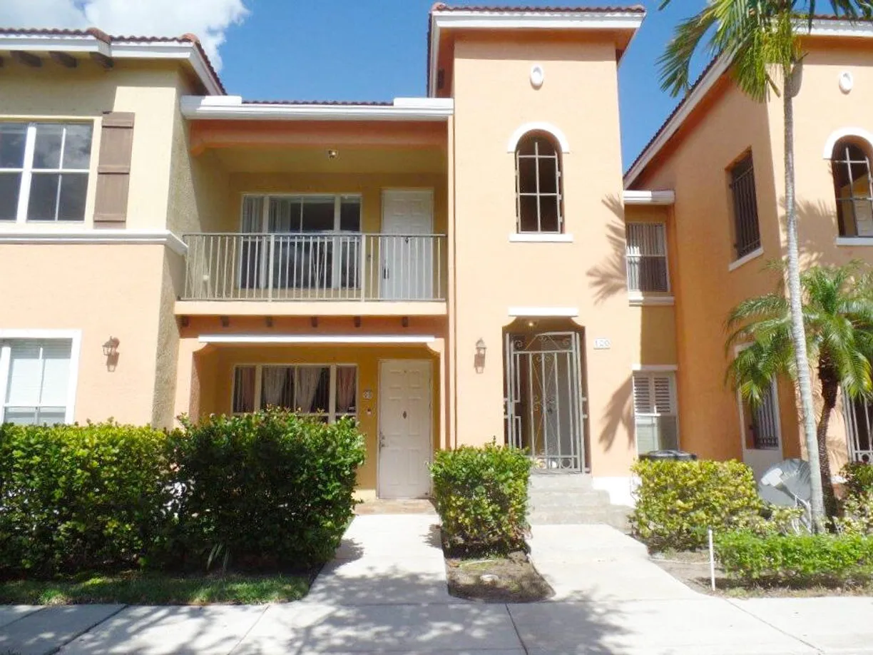 South Florida Real Estate | View 3569 Forest Hill Boulevard, 100 | 2 Beds, 2 Baths