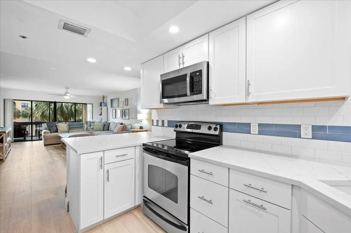 South Florida Real Estate | View 700 Uno Lago Drive, 303 | 2 Beds, 2 Baths