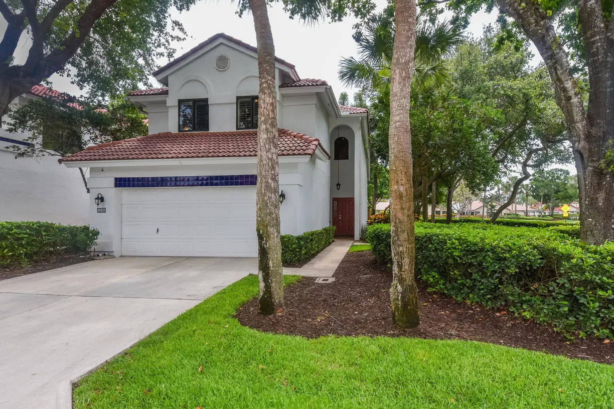 South Florida Real Estate | View 5620 Amersham Way | 3 Beds, 2 Baths