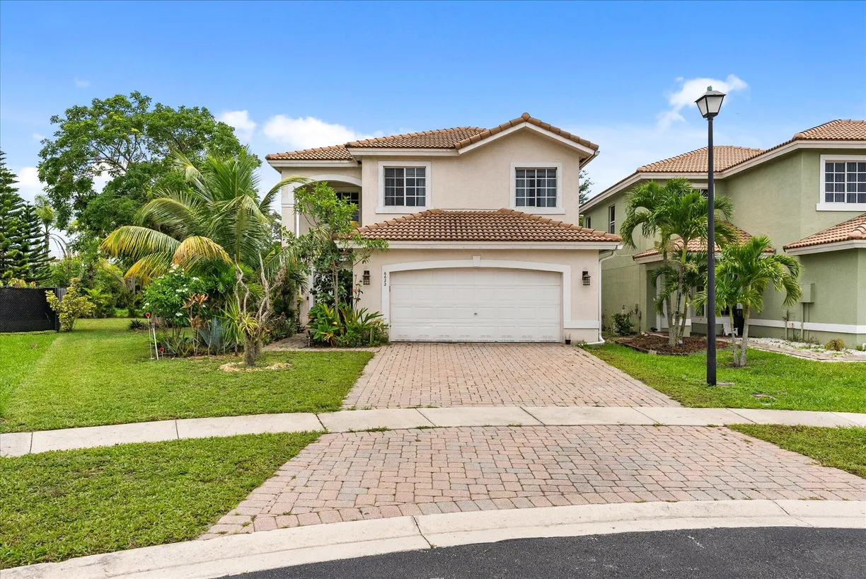 South Florida Real Estate | View 6622 Adriatic Way | 4 Beds, 2 Baths