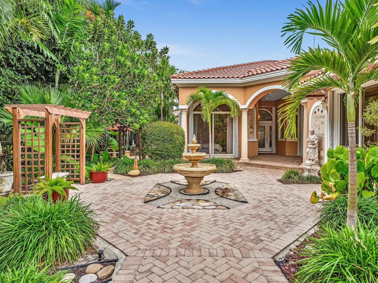 South Florida Real Estate | View 1107 Periwinkle Lane | 5 Beds, 3 Baths