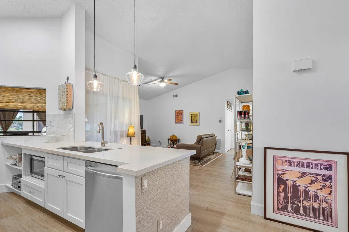 South Florida Real Estate | View 6055 Parkwalk Drive | 2 Beds, 2 Baths