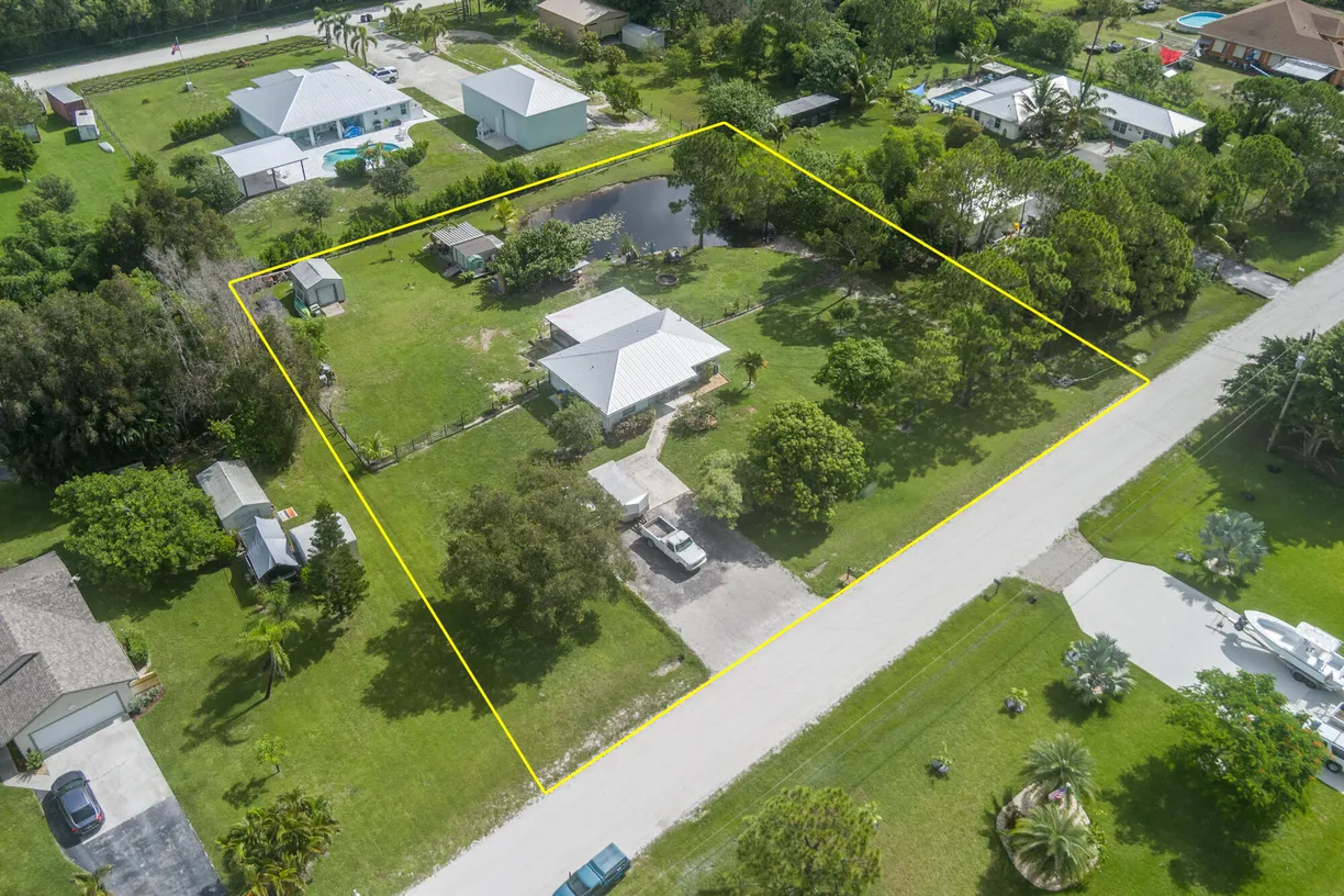 South Florida Real Estate | View 13925 78th Place | 3 Beds, 2 Baths