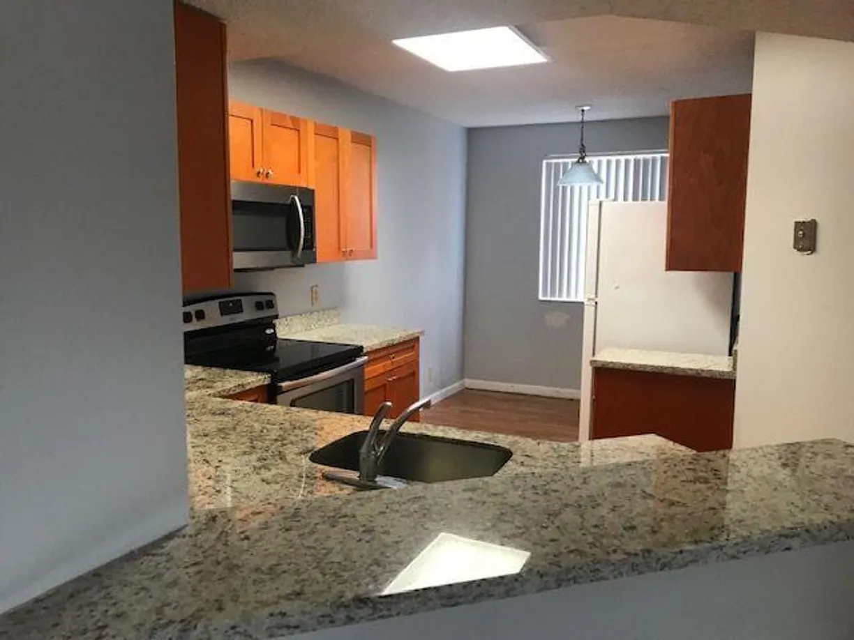 South Florida Real Estate | View 8801 Wiles Road, 302 | Listing