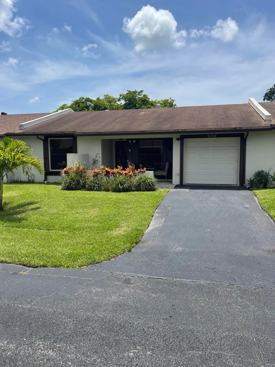 South Florida Real Estate | View 5058 Forsythia Street | 2 Beds, 2 Baths