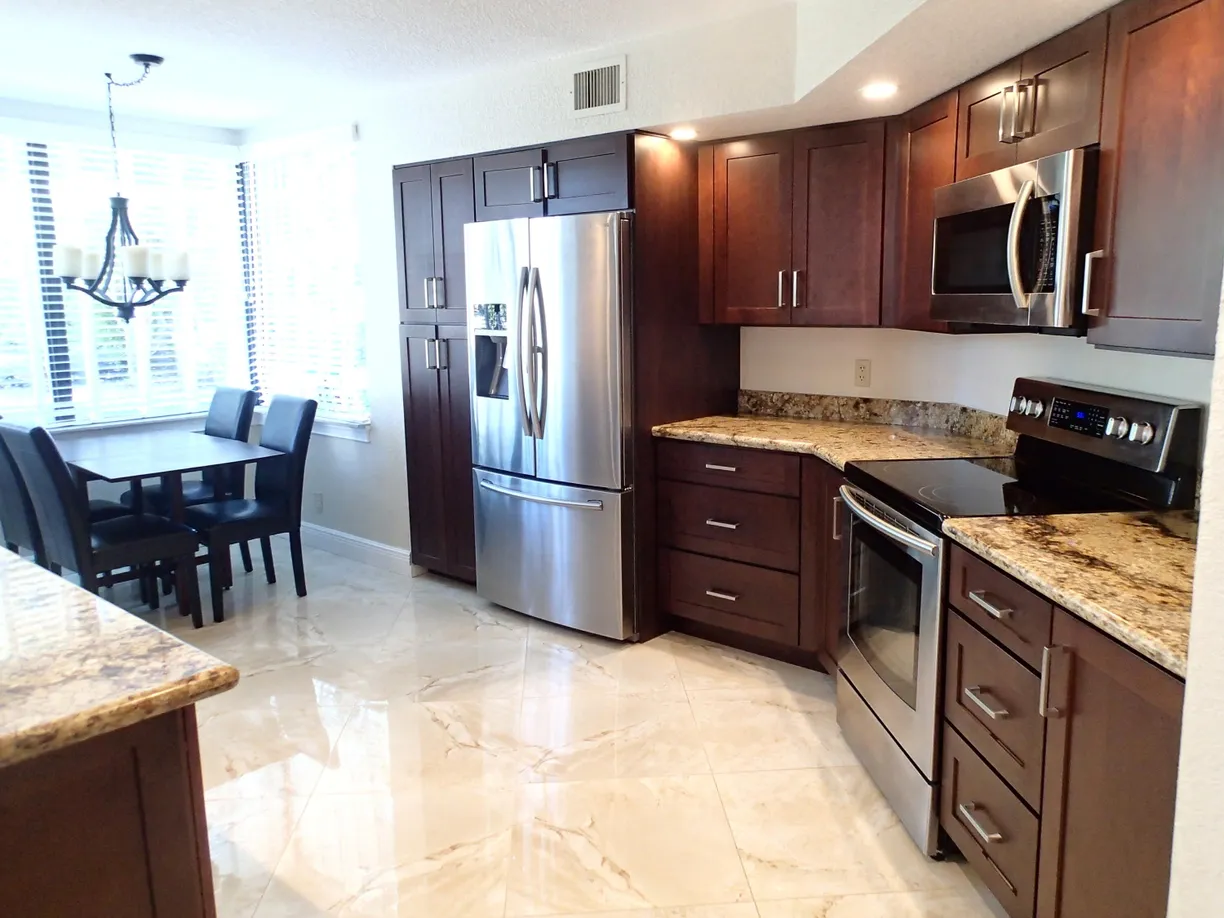 South Florida Real Estate | View 115 Bay Colony Drive | 3 Beds, 2 Baths