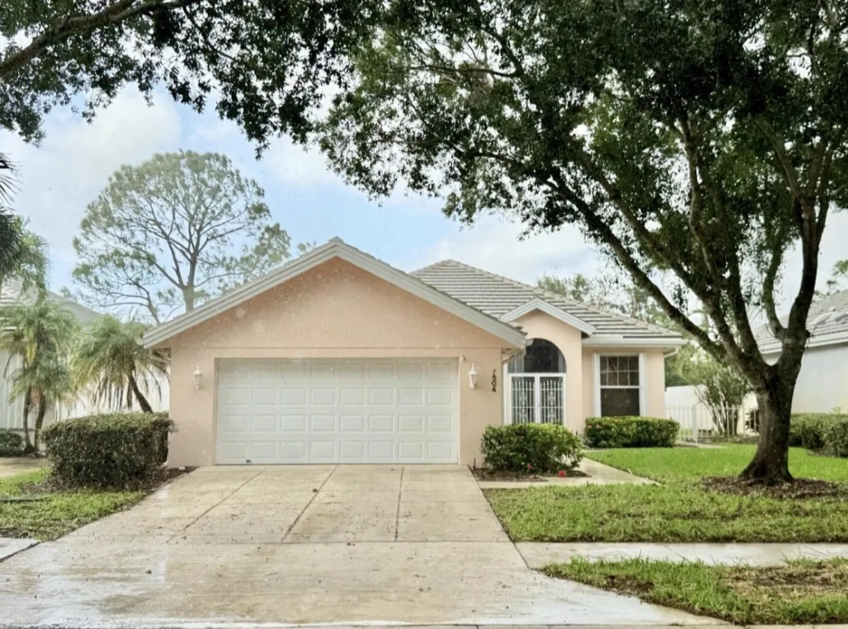 South Florida Real Estate | View 7504 SE Marsh Fern Lane | 3 Beds, 2 Baths