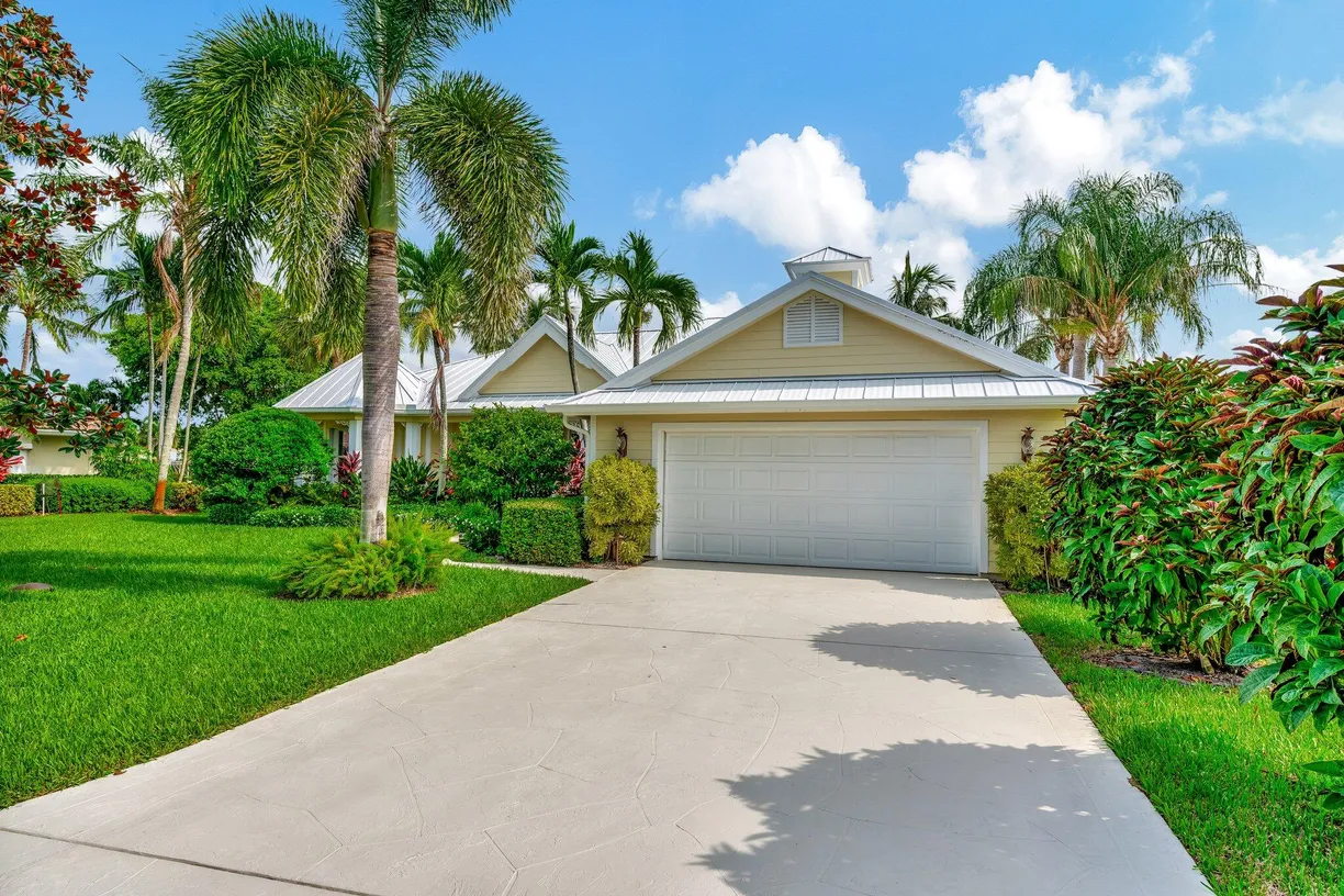 South Florida Real Estate | View 7937 SE Osprey Street | 4 Beds, 3 Baths