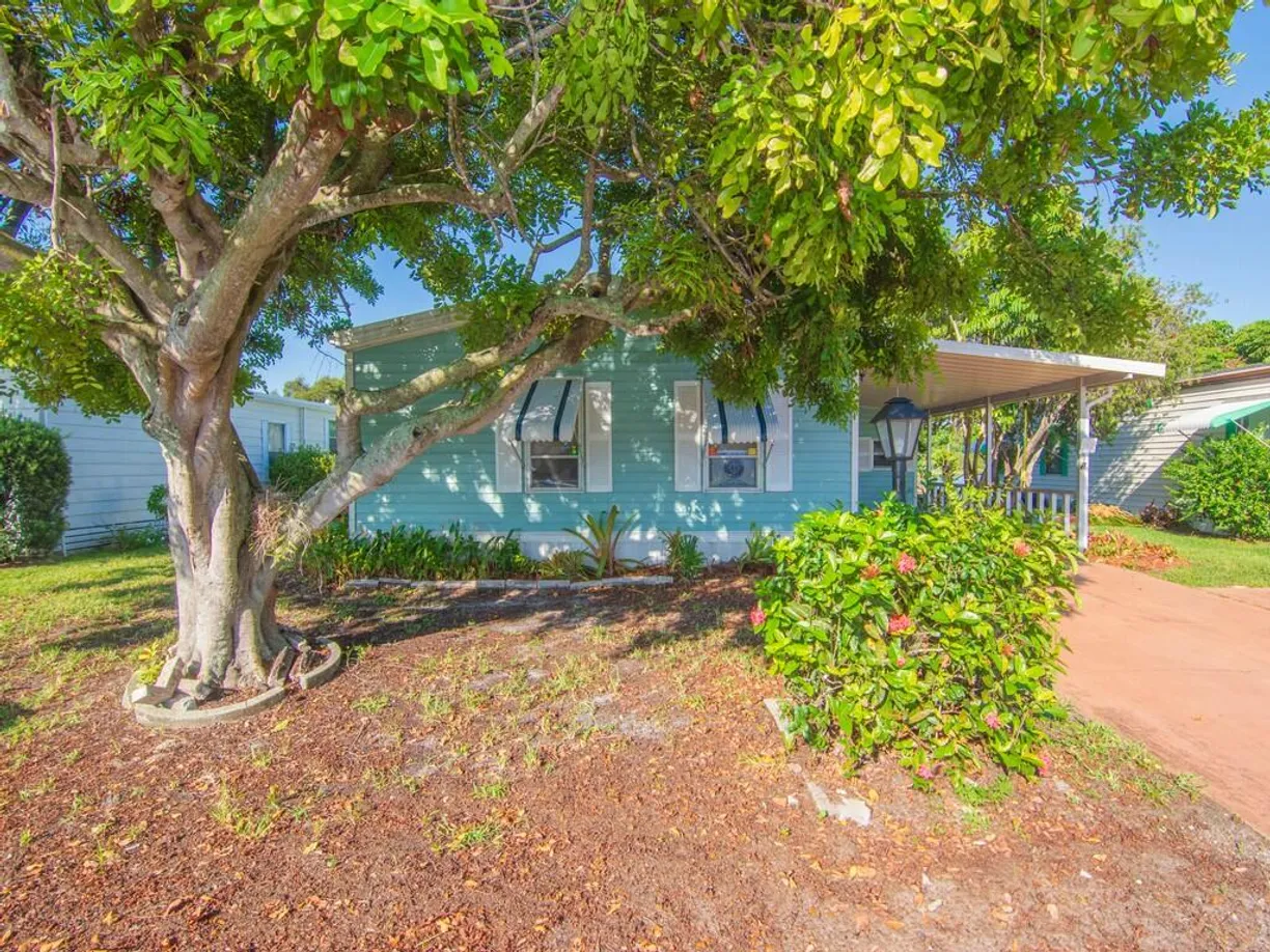 South Florida Real Estate | View 6910 SE Morningside Drive | Listing