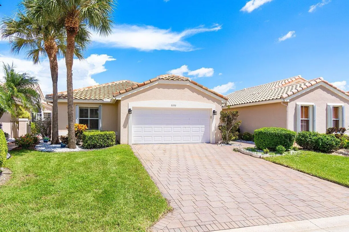 South Florida Real Estate | View 5153 Pelican Cove Drive | 3 Beds, 2 Baths