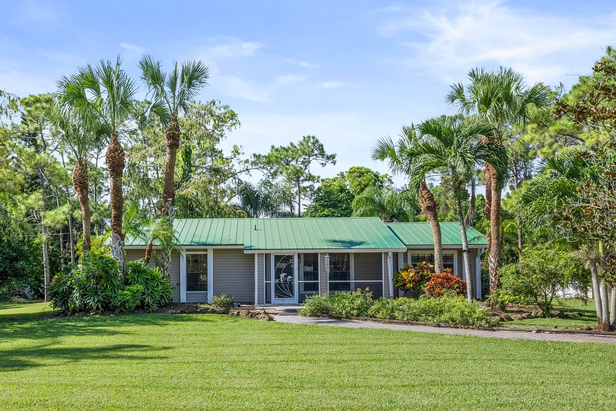 South Florida Real Estate | View 16112 E Edinburgh Drive | 3 Beds, 2 Baths
