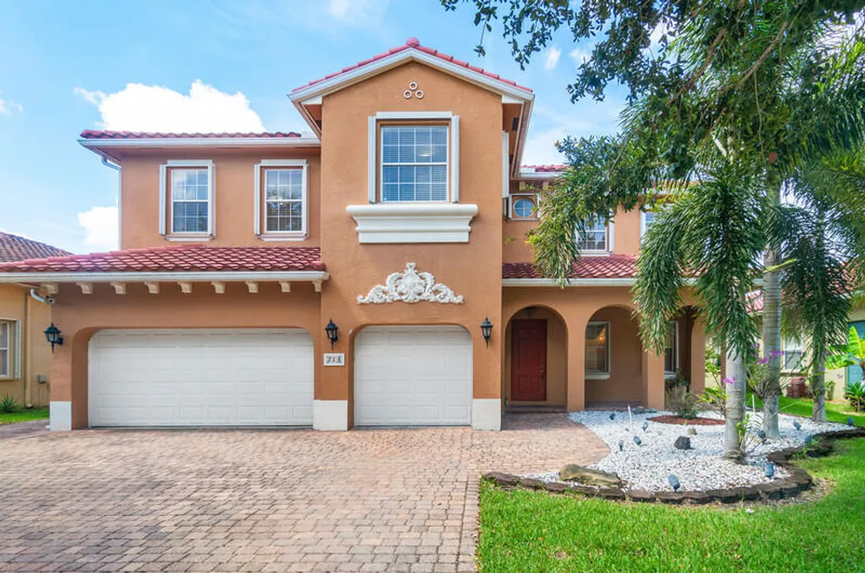 South Florida Real Estate | View 713 Cresta Circle | 5 Beds, 4 Baths