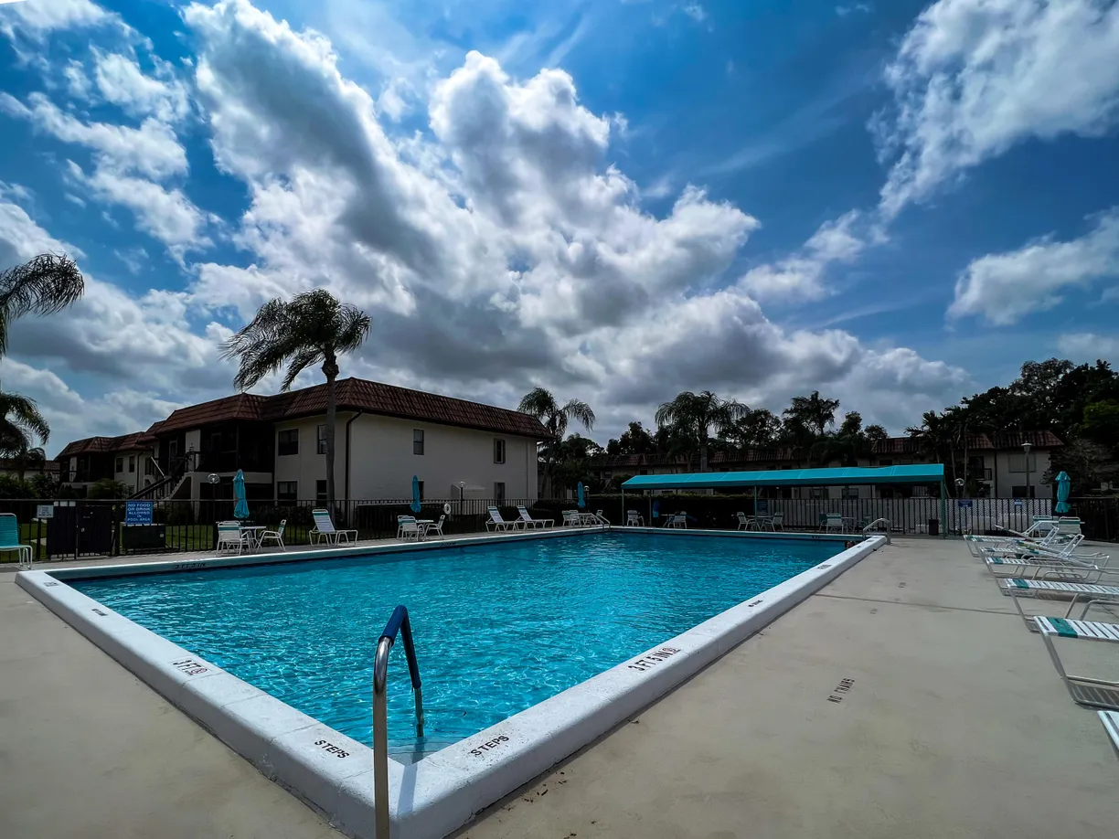 South Florida Real Estate | View 7281 Golf Colony Court, 205 | 2 Beds, 2 Baths
