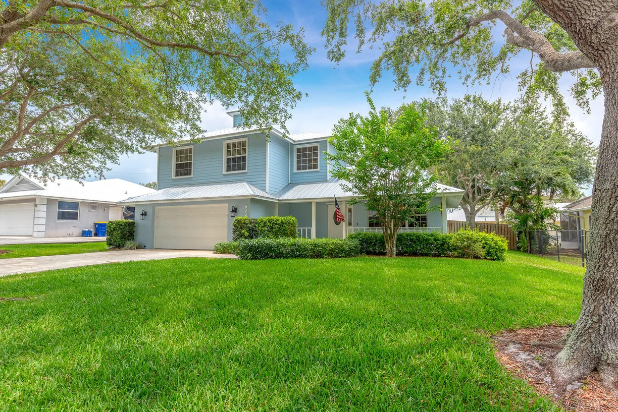 South Florida Real Estate | View 9325 SE Mercury Street | 4 Beds, 3 Baths