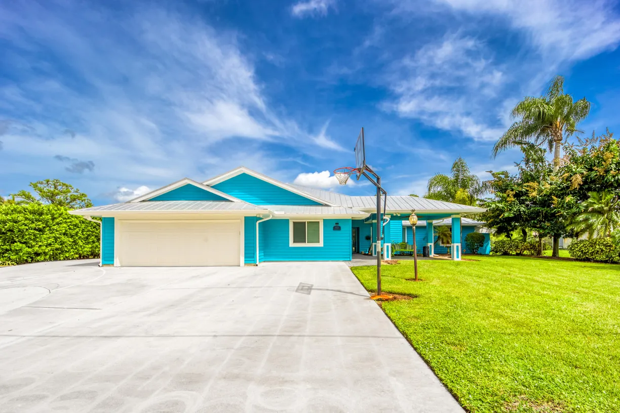 South Florida Real Estate | View 1121 SW Pine Tree Lane | 4 Beds, 4 Baths