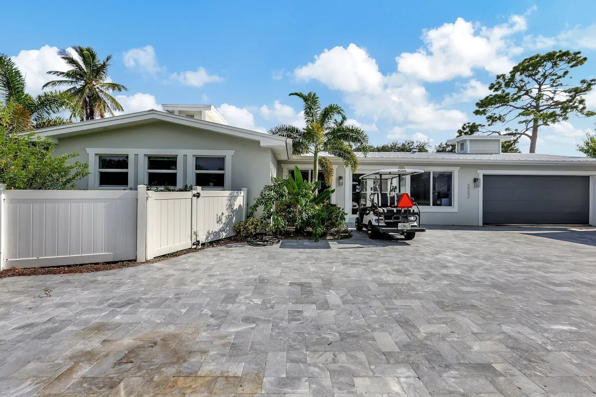 South Florida Real Estate | View 3902 SE Coquina Drive | 4 Beds, 5 Baths