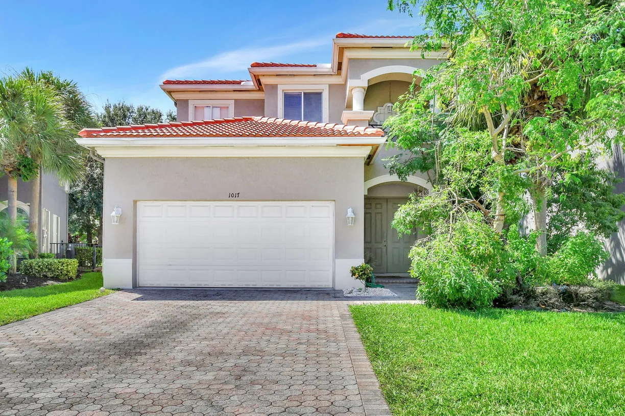 South Florida Real Estate | View 1017 Grove Park Circle | 4 Beds, 2 Baths