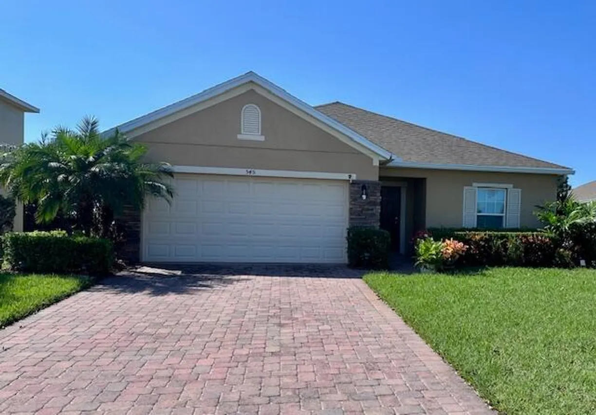 South Florida Real Estate | View 545 Valencia Circle | 4 Beds, 2 Baths