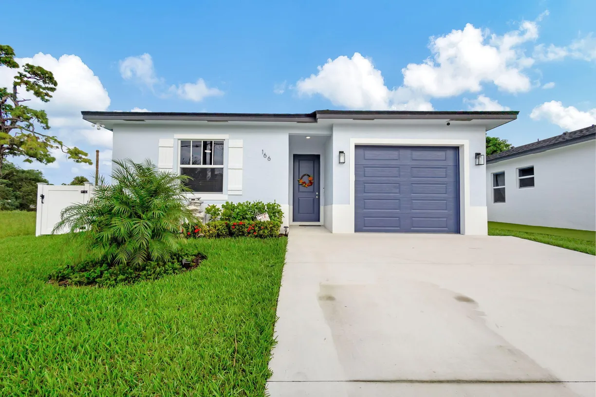 South Florida Real Estate | View 166 Neva Drive | 3 Beds, 2 Baths