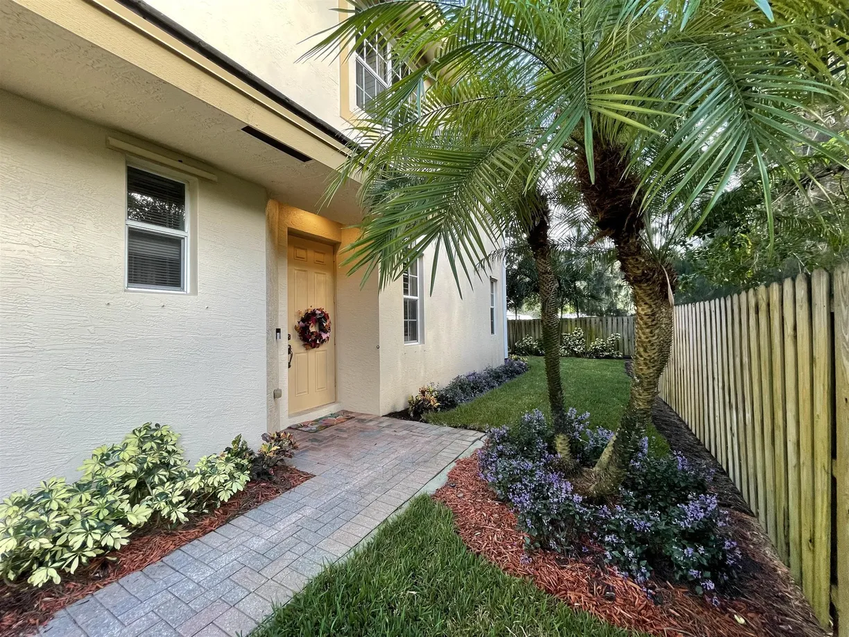 South Florida Real Estate | View 328 SE Bloxham Way | 4 Beds, 3 Baths