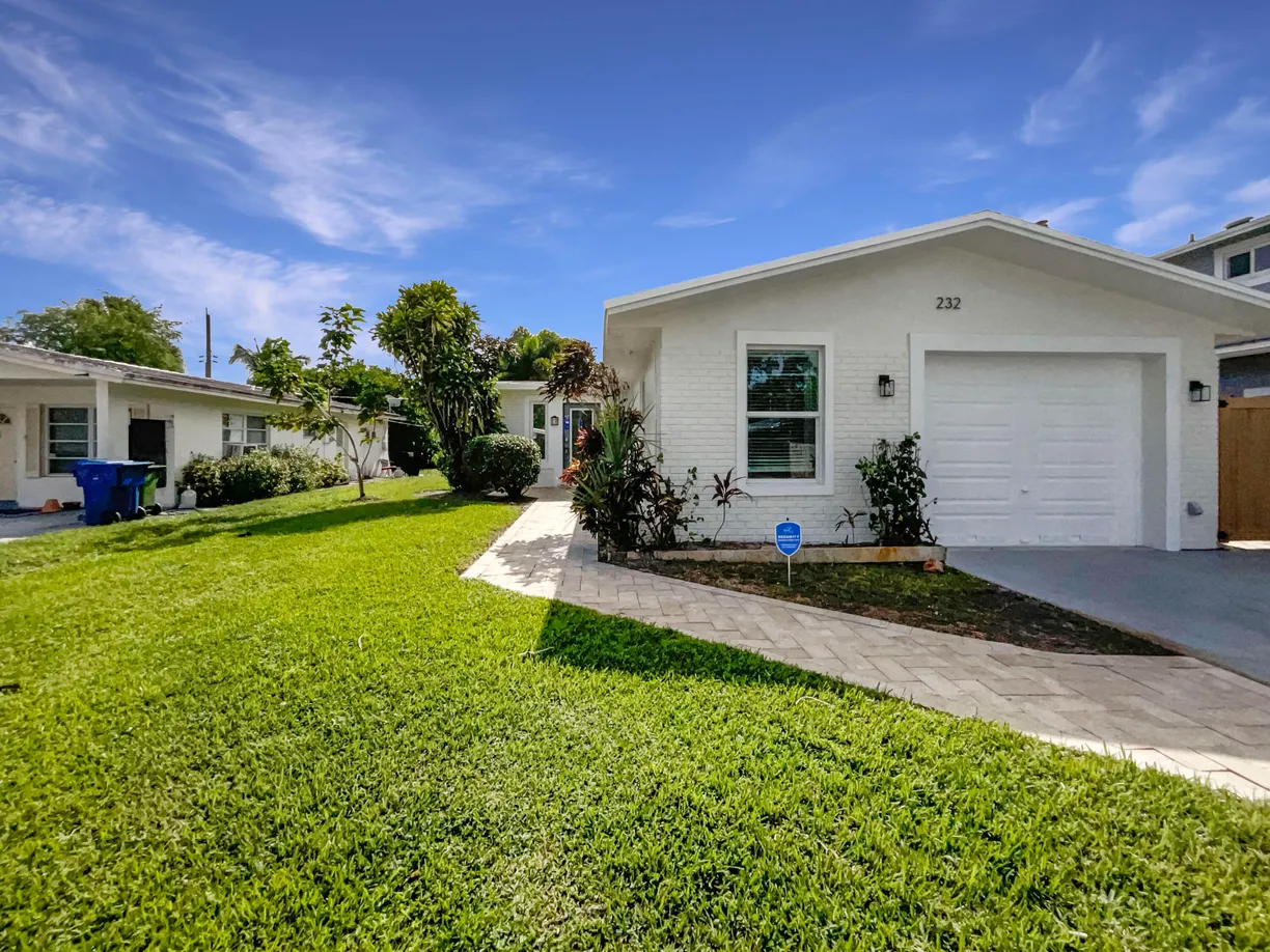 South Florida Real Estate | View 232 NW 25th Street | 2 Beds, 2 Baths