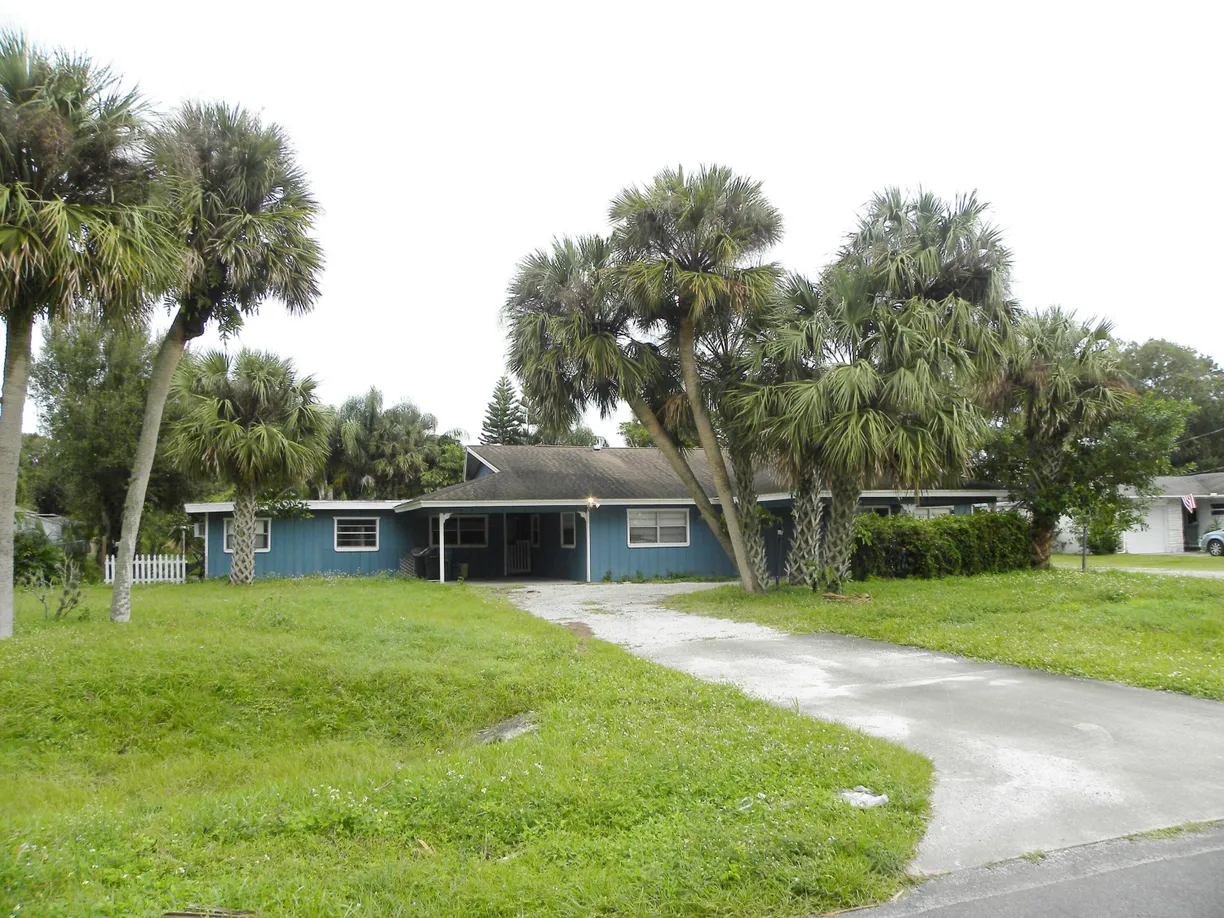 South Florida Real Estate | View 8206 Lakeland Boulevard | 3 Beds, 2 Baths