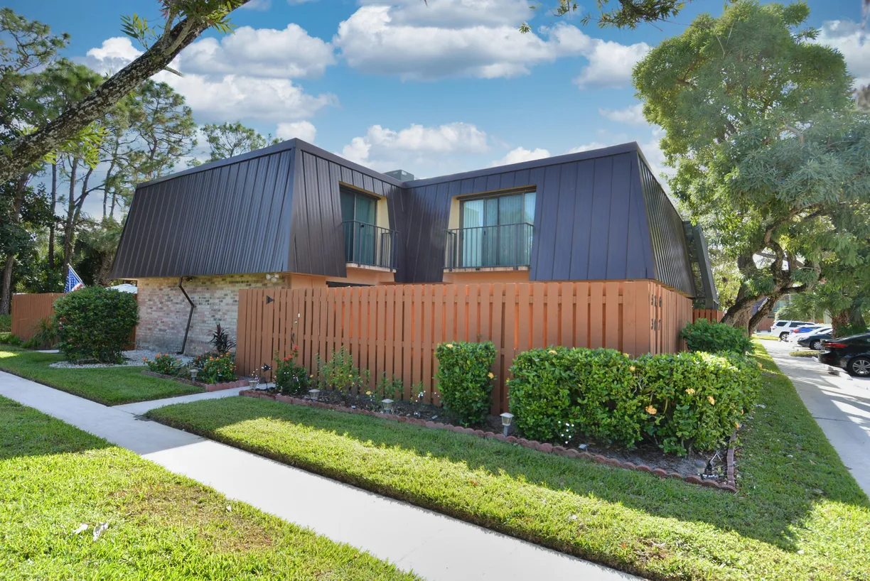 South Florida Real Estate | View 5760 SE Windsong Lane, 307 | 2 Beds, 2 Baths
