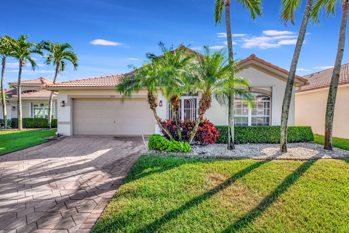 South Florida Real Estate | View 5959 Royal Club Drive | 3 Beds, 2 Baths