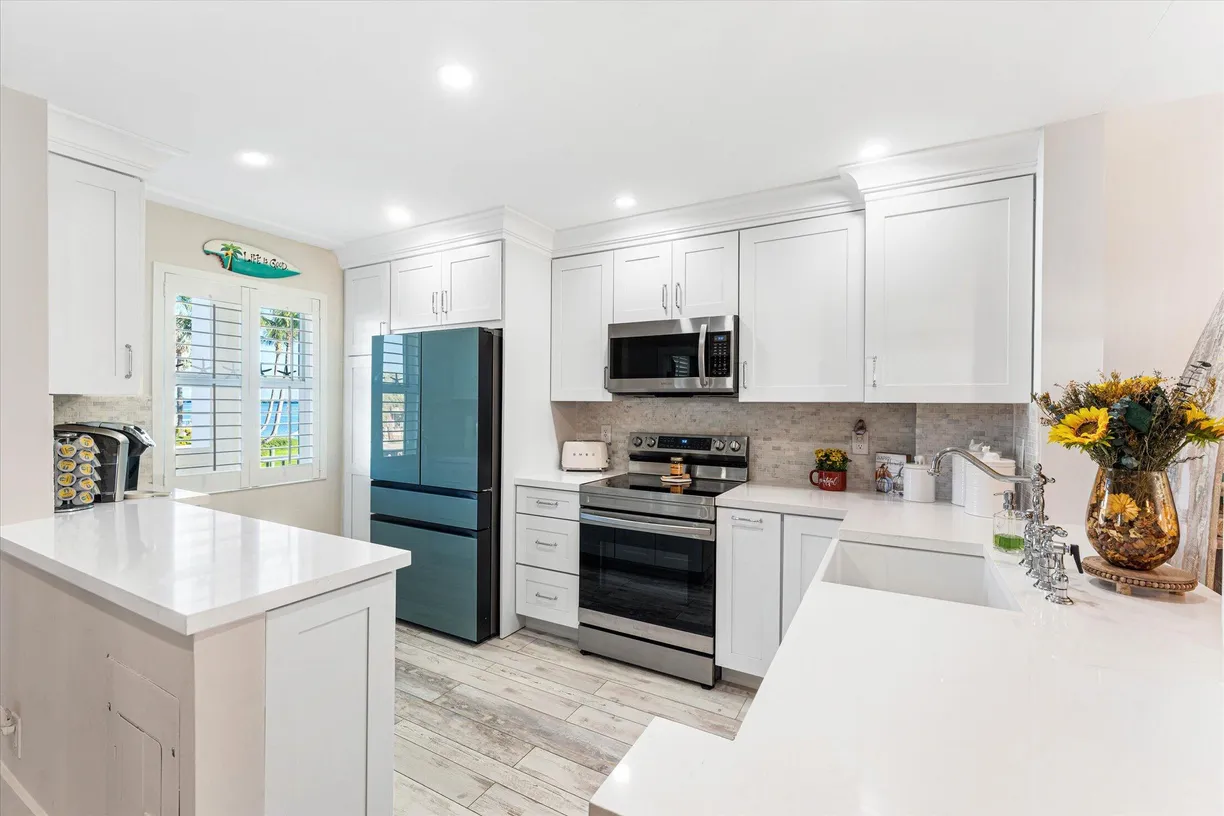 South Florida Real Estate | View 105 Paradise Harbour Boulevard, 206 | 3 Beds, 2 Baths