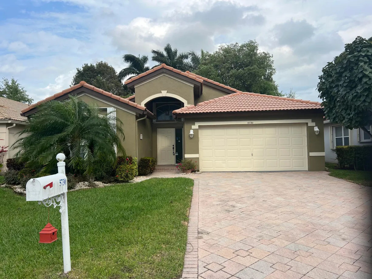 South Florida Real Estate | View 5730 Royal Club Drive | 3 Beds, 2 Baths