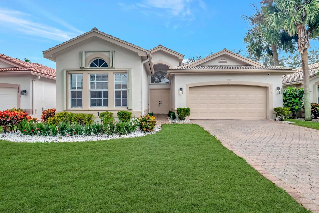 South Florida Real Estate | View 7588 San Carlos Street | 3 Beds, 2 Baths