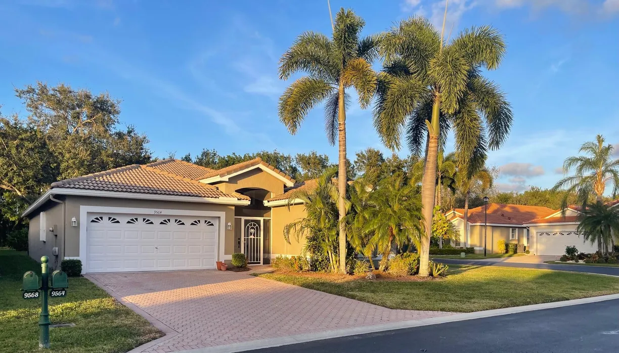 South Florida Real Estate | View 9564 Honeybell Circle | 3 Beds, 2 Baths