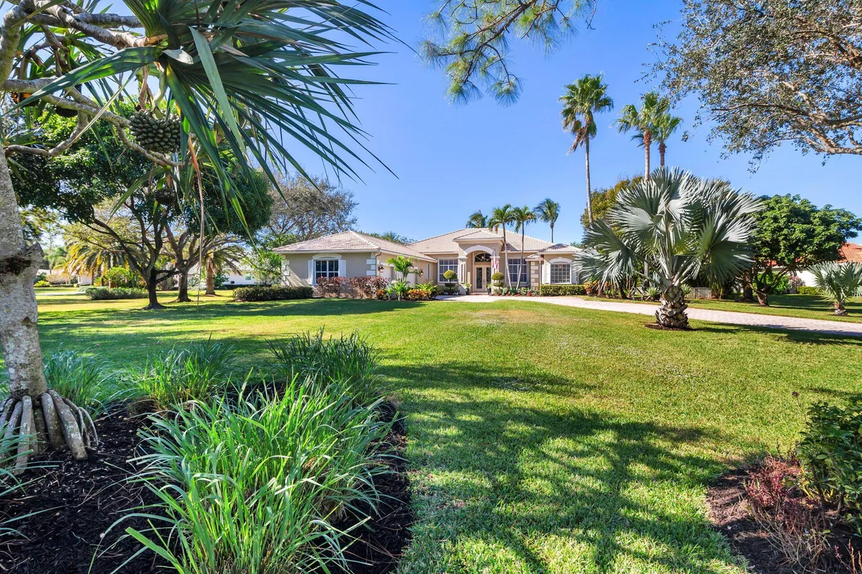 South Florida Real Estate | View 7605 Woodsmuir Drive | 4 Beds, 4 Baths