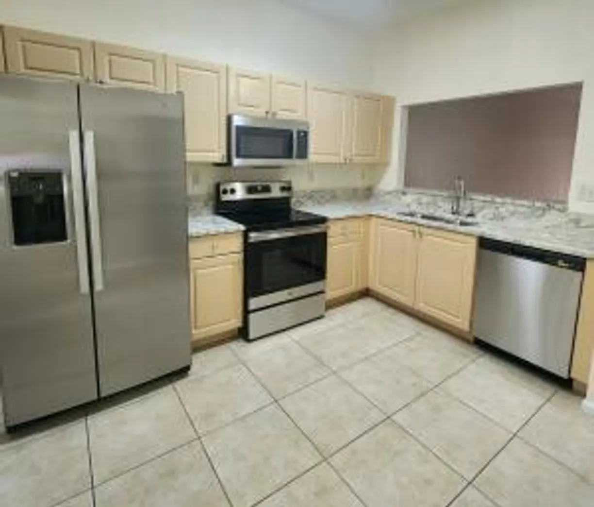 South Florida Real Estate | View 5961 Forest Hill Boulevard, 101 | 2 Beds, 2 Baths