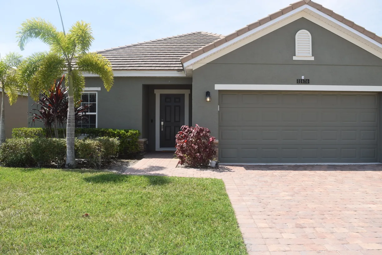 South Florida Real Estate | View 11674 SW Rowena Street | 4 Beds, 2 Baths