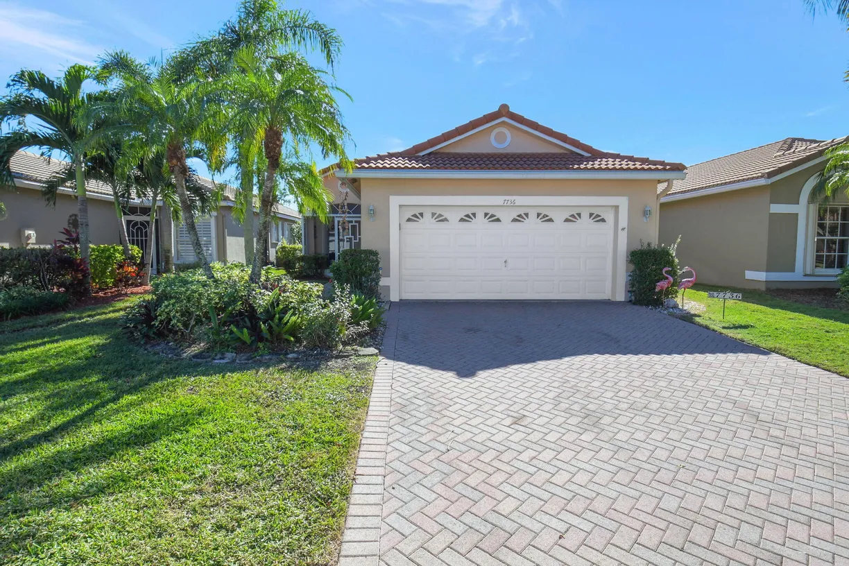 South Florida Real Estate | View 7736 Cherry Blossom Street | 2 Beds, 2 Baths