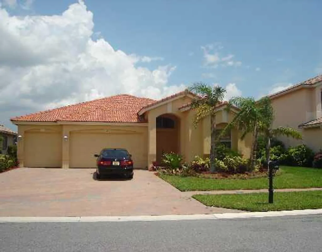 South Florida Real Estate | View 121 Tuscany Drive | 4 Beds, 3 Baths
