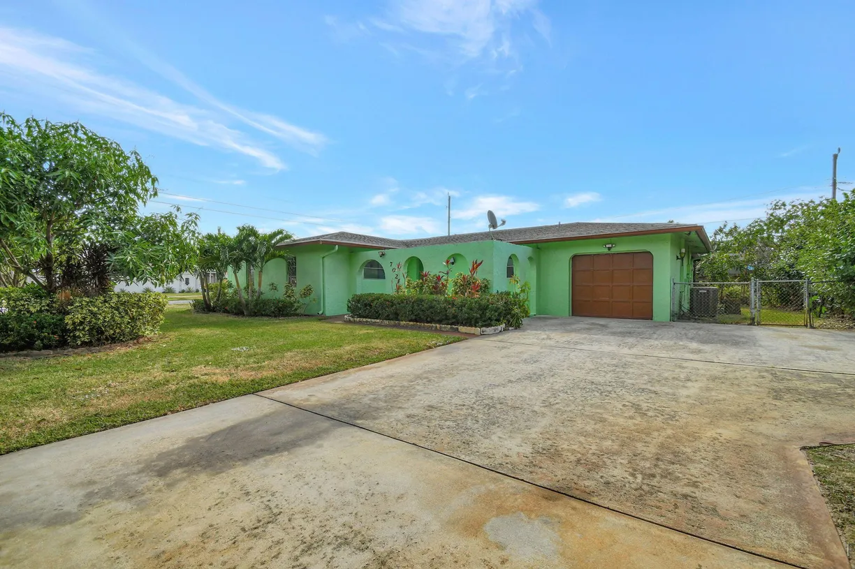 South Florida Real Estate | View 702 SW 23rd Terrace | Listing
