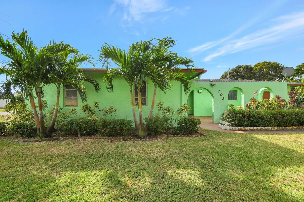 South Florida Real Estate | View 702 SW 23rd Terrace | 3 Beds, 2 Baths