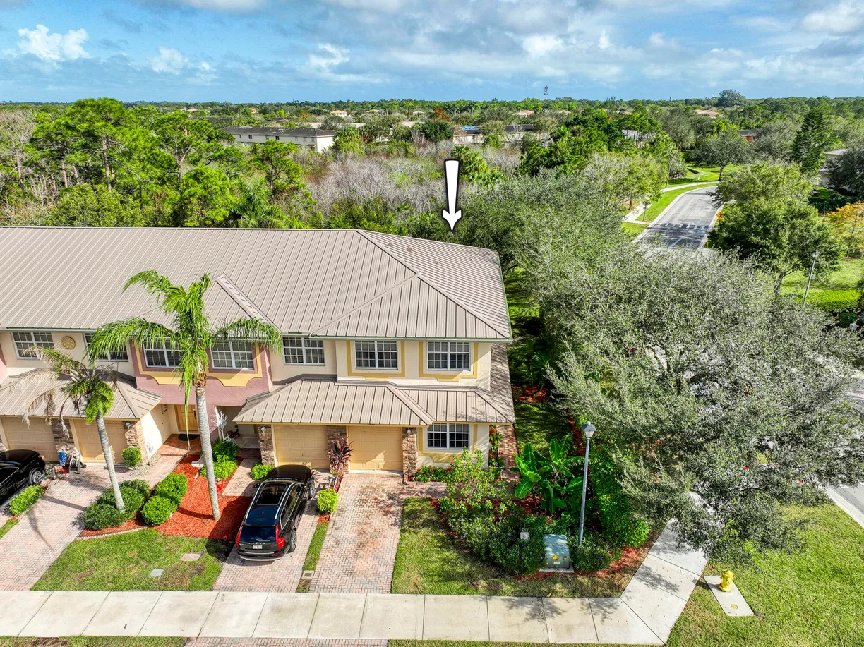 South Florida Real Estate | View 5447 SE Moseley Drive | 4 Beds, 3 Baths
