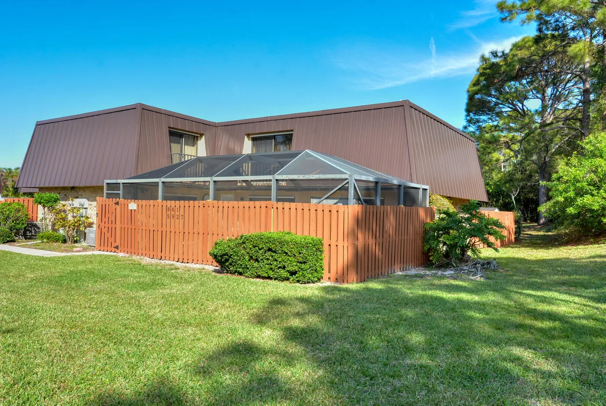 South Florida Real Estate | View 5927 SE Windsong Lane, 841 | 3 Beds, 2 Baths