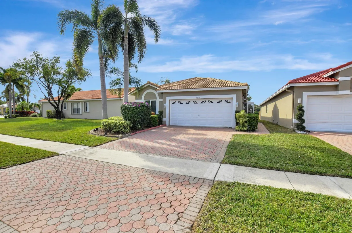 South Florida Real Estate | View 9629 Cherry Blossom Court | 3 Beds, 2 Baths